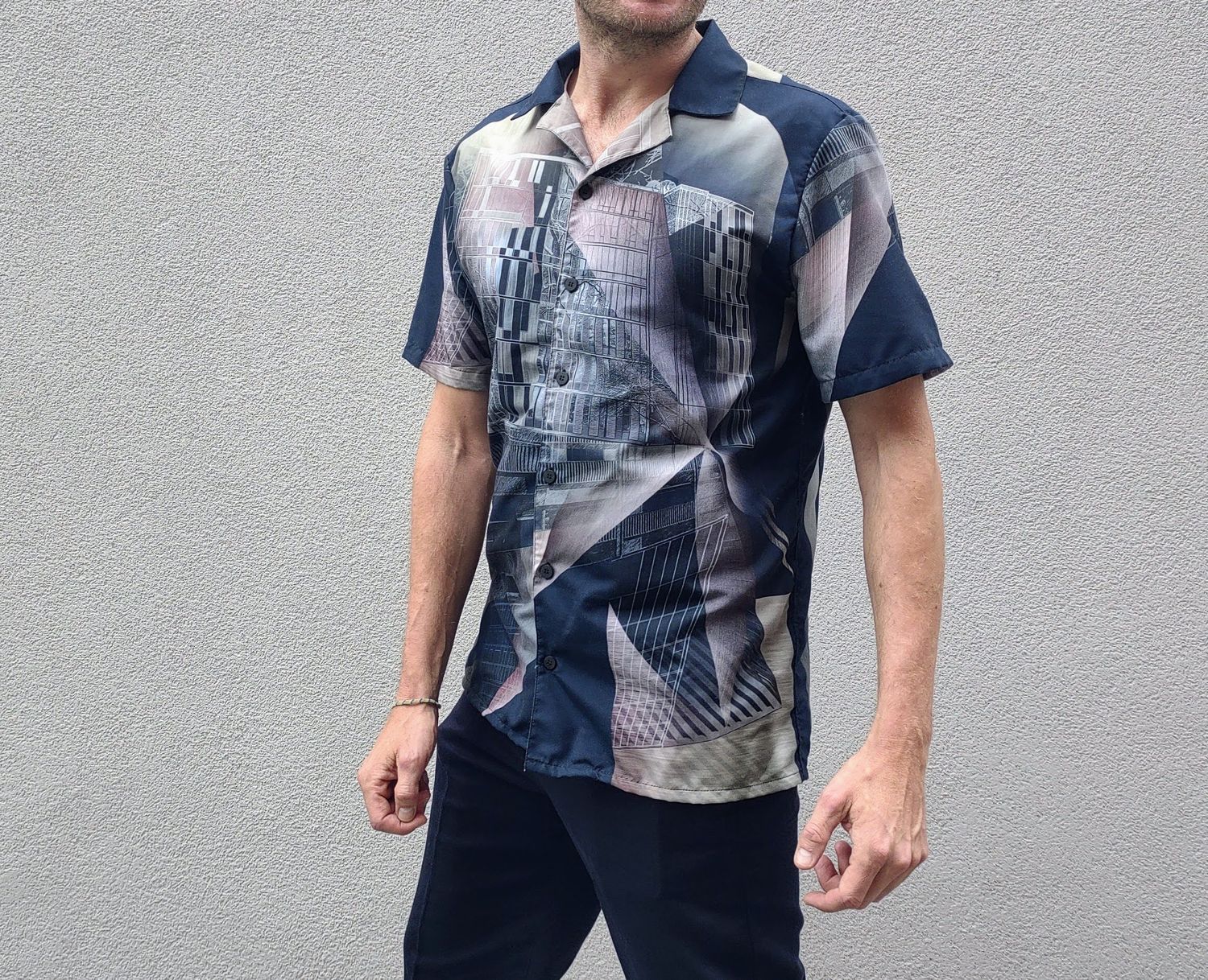 Østerbrogården, unisex button shirt. Make sure when ordering this shirt 2 sizes smaller than normal as it is oversized.