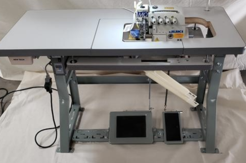 JUKI INDUSTRIAL MO 6799 4 THREAD OVERLOCK W/ TABLE + LIGHT