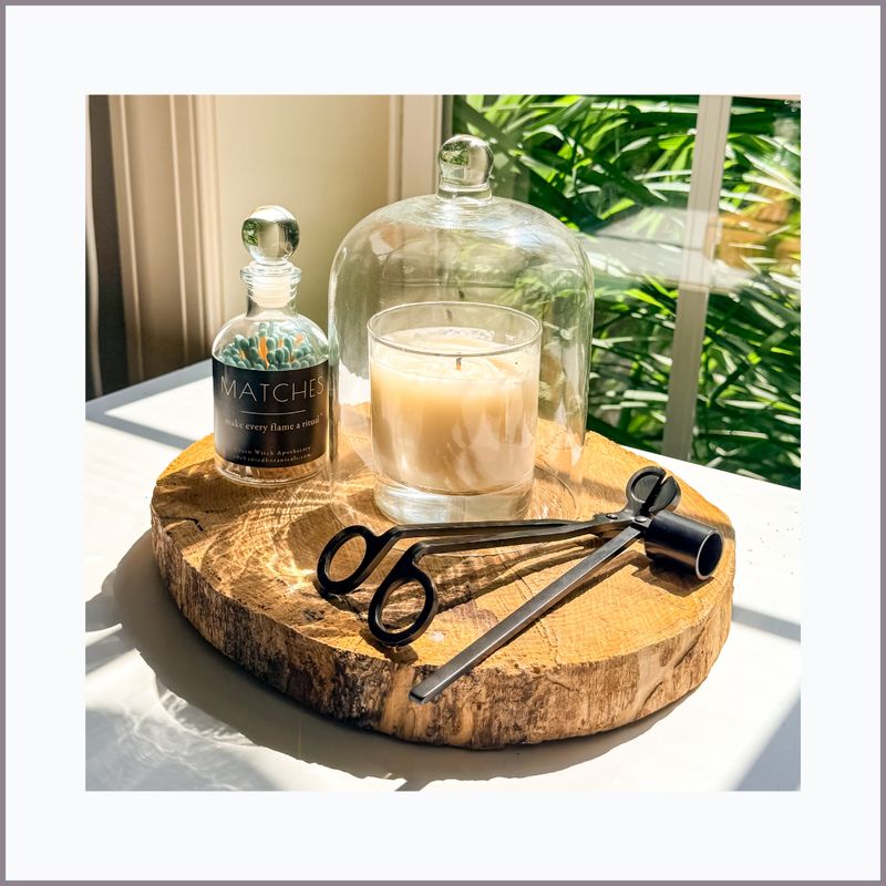 The Good Candle Set with glass cloche, matches, black iron wick trimmer and candle snuffer