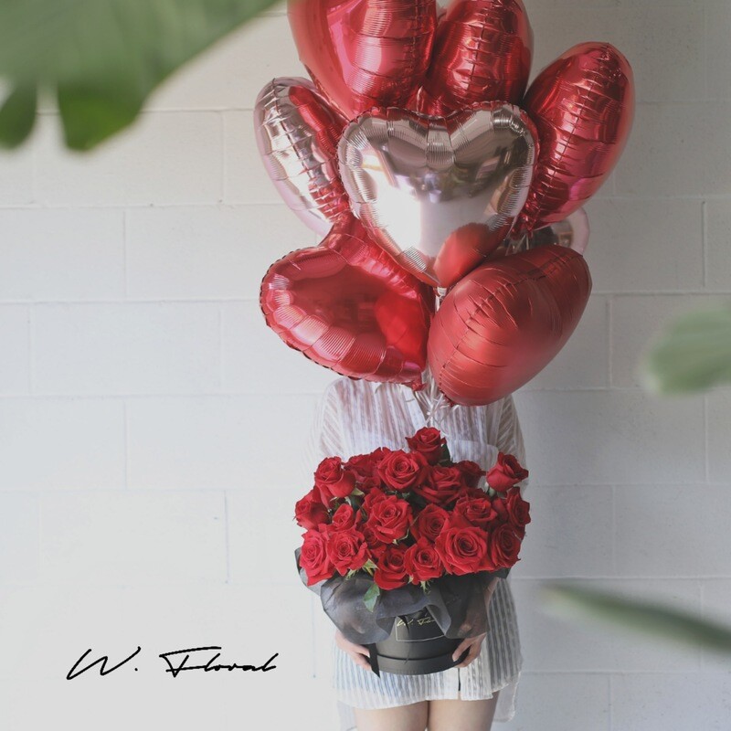 Red rose flower box with floating heart balloons by W Floral Studio Toronto