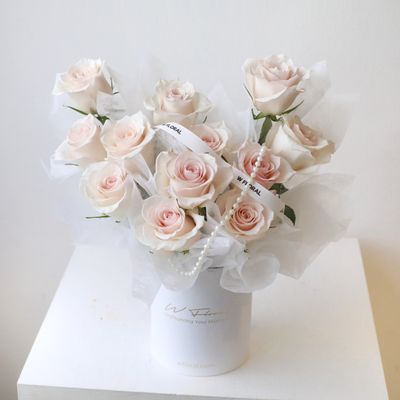 Pink rose box arrangement with premium fresh roses in garden style