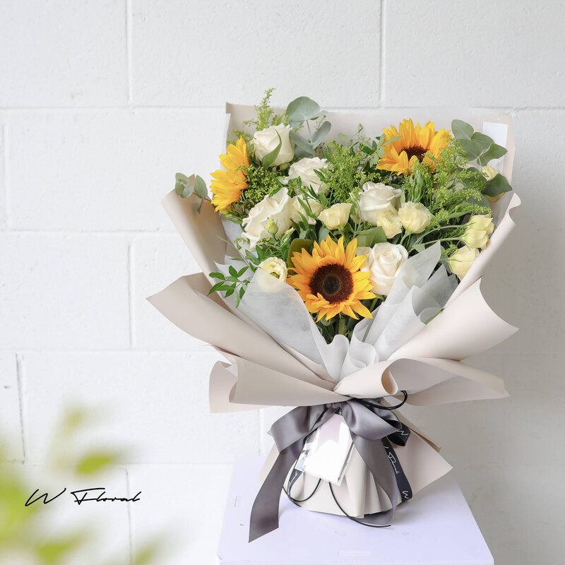 Cheerful sunflower bouquet with white roses