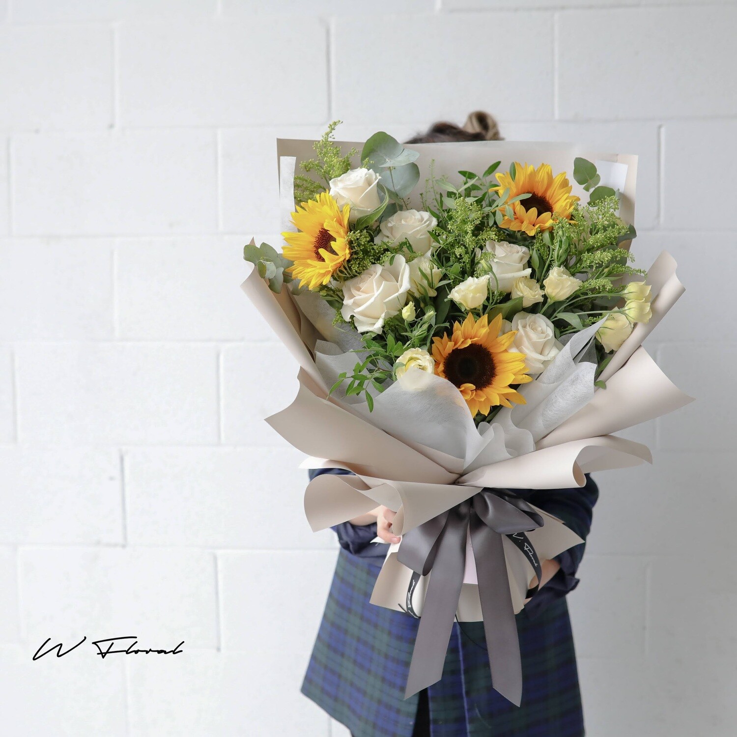 Sunflower and rose mixed bouquet by W Floral Studio