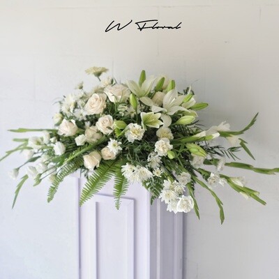 Serene White Funeral Casket Spray