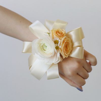 Fresh flower wrist corsage with blush roses and ivory ribbon by W Floral Toronto