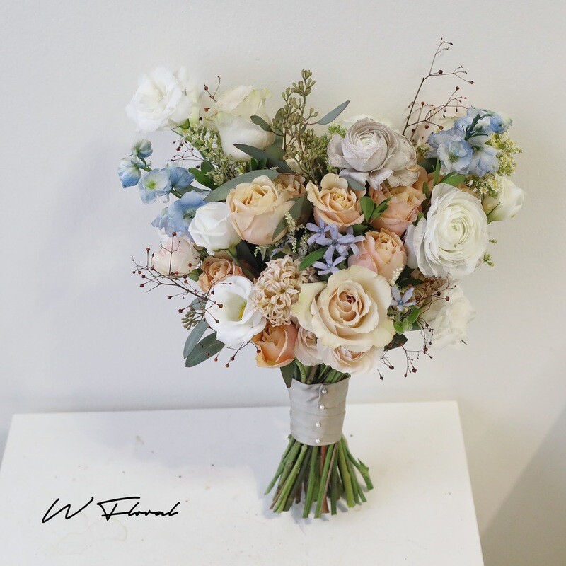 Wildflower-inspired bridal bouquet by W Floral Studio