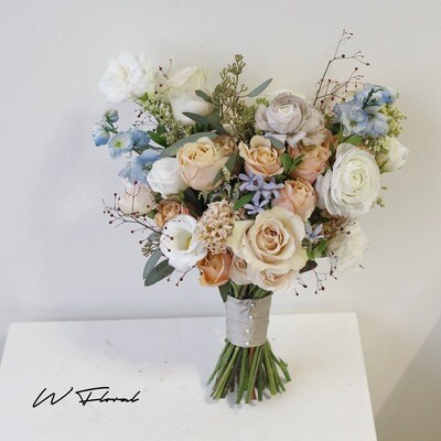 Wildflower-inspired bridal bouquet by W Floral Studio