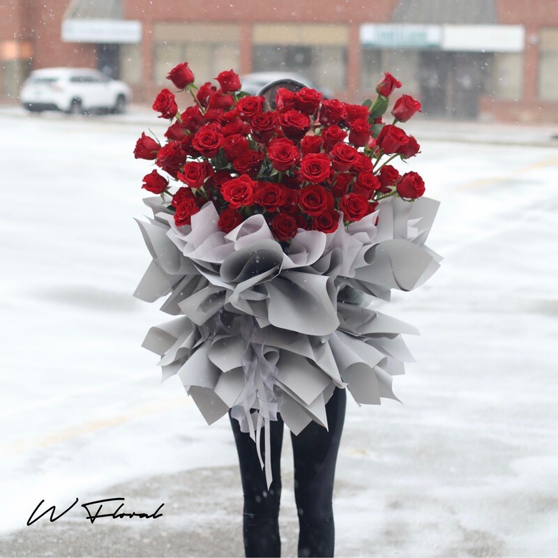 Grand luxurious red rose bouquet with premium fresh roses