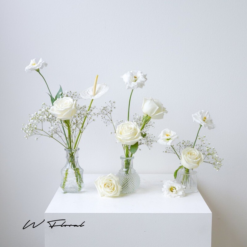 Wedding bud vase centrepiece with white roses and seasonal flowers by W Floral Toronto