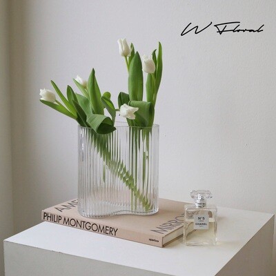 Clear textured flower vase with elegant vertical ribbed details