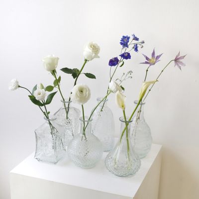 Sculptural clear glass bud vase with modern artistic silhouette