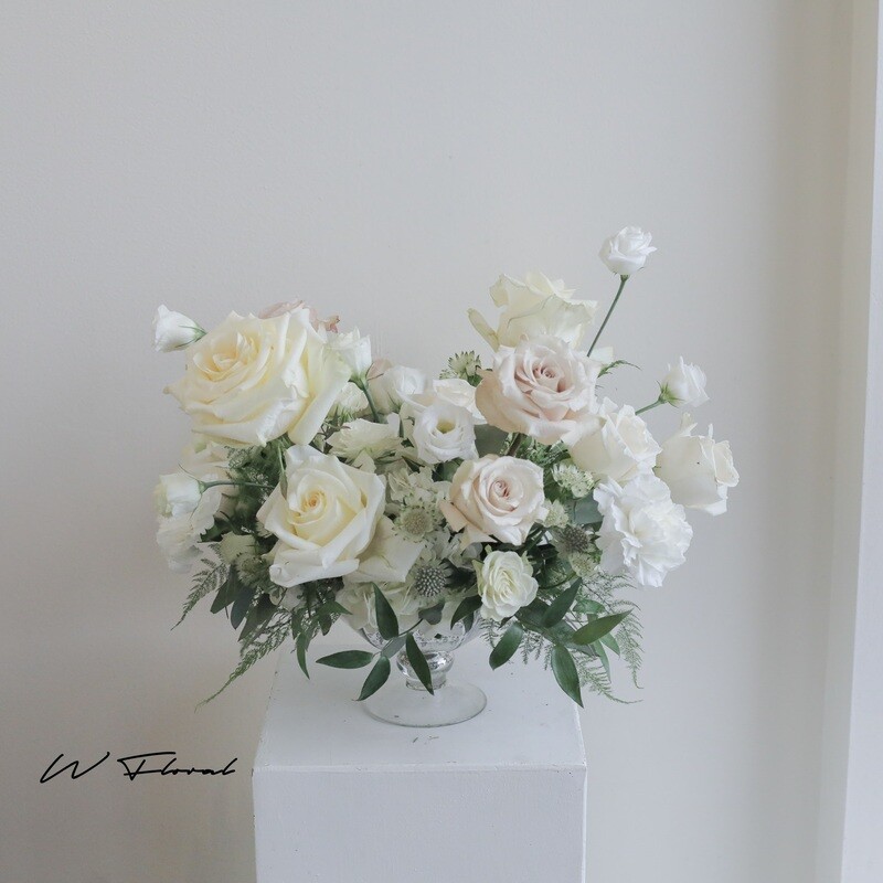 Lida gold hurricane bowl centrepiece with fresh wedding flowers