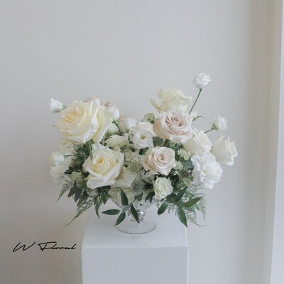 Lida gold hurricane bowl centrepiece with fresh wedding flowers