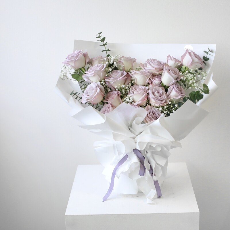 Purple rose bouquet with lavender roses, baby’s breath and greenery for Toronto delivery