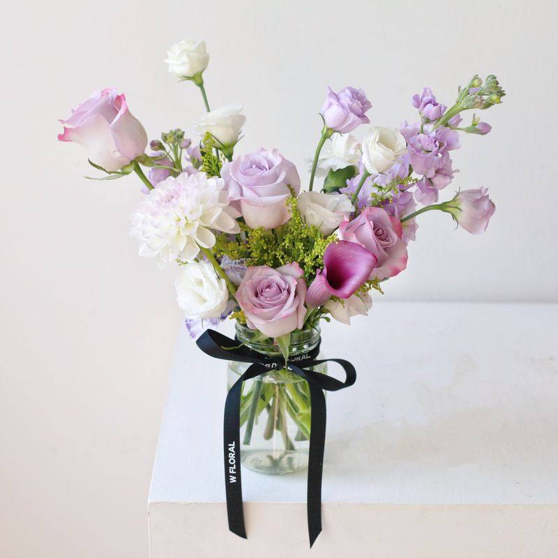 Seasonal Maison jar flower arrangement in purple tones