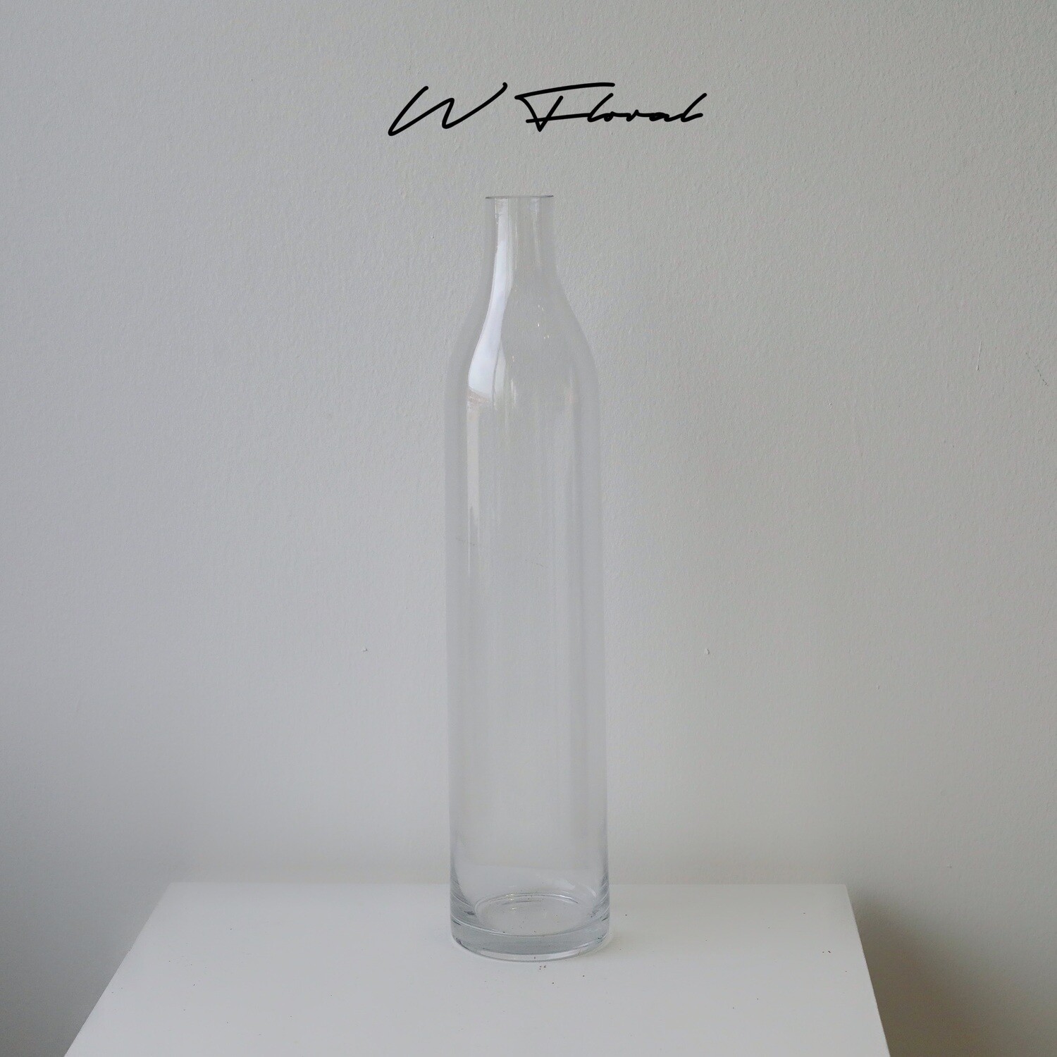 Tall bottleneck vase with slender minimalist silhouette