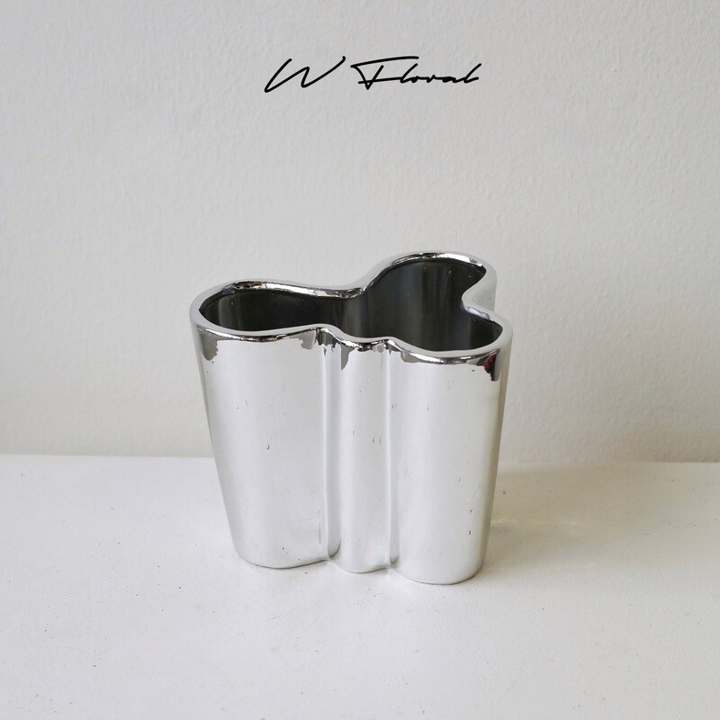 Sculptural silver cloud vase with fluid modern silhouette