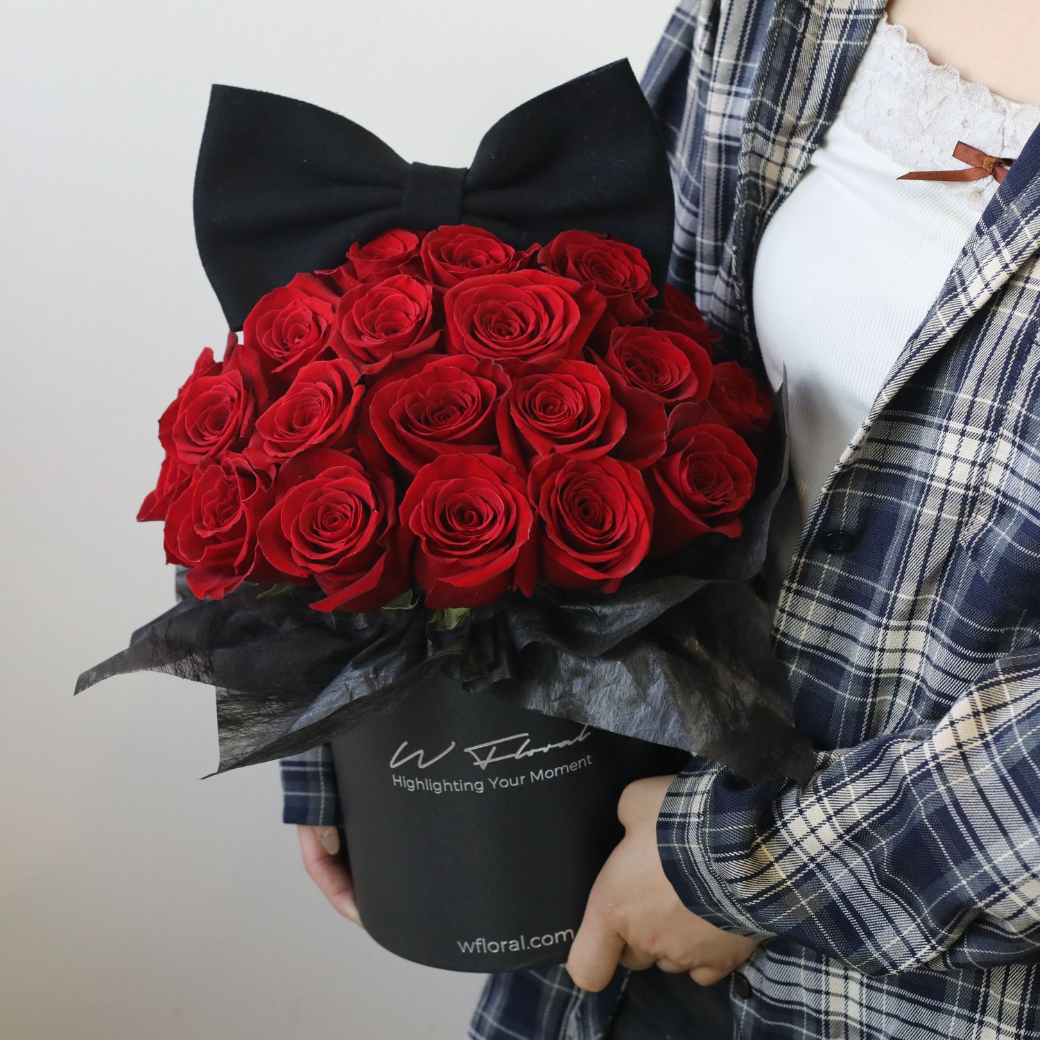 Red rose flower box with oversized black bow by W Floral Studio Toronto