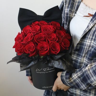 Red rose flower box with oversized black bow by W Floral Studio Toronto