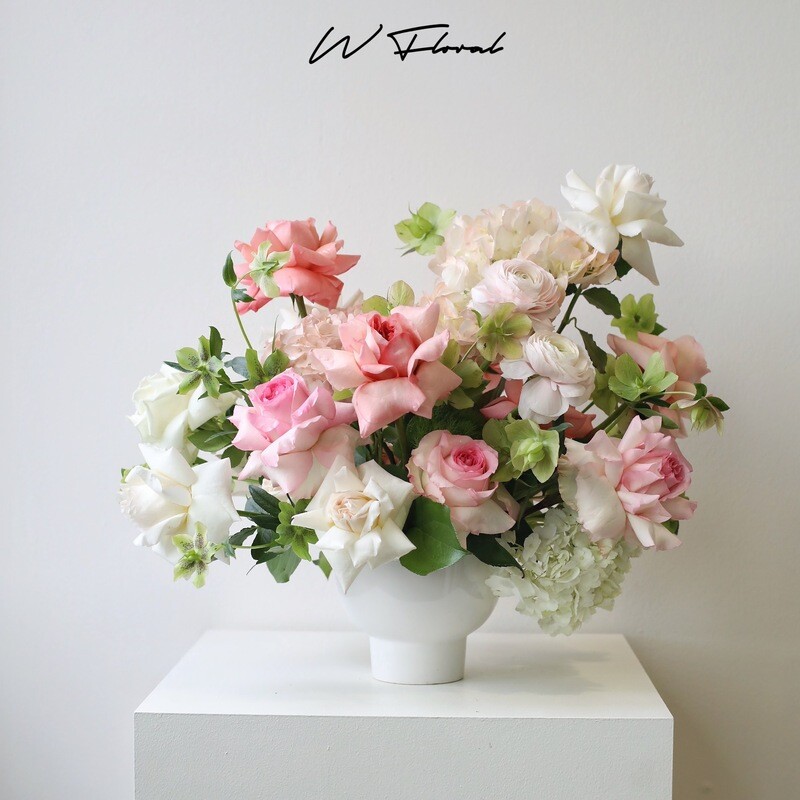 Pink and blush luxury statement flower arrangement with premium seasonal blooms