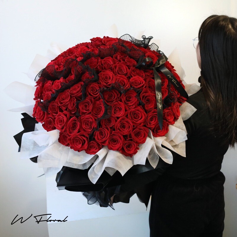 Classic round red rose bouquet with elegant wrapping by W Floral Studio Toronto