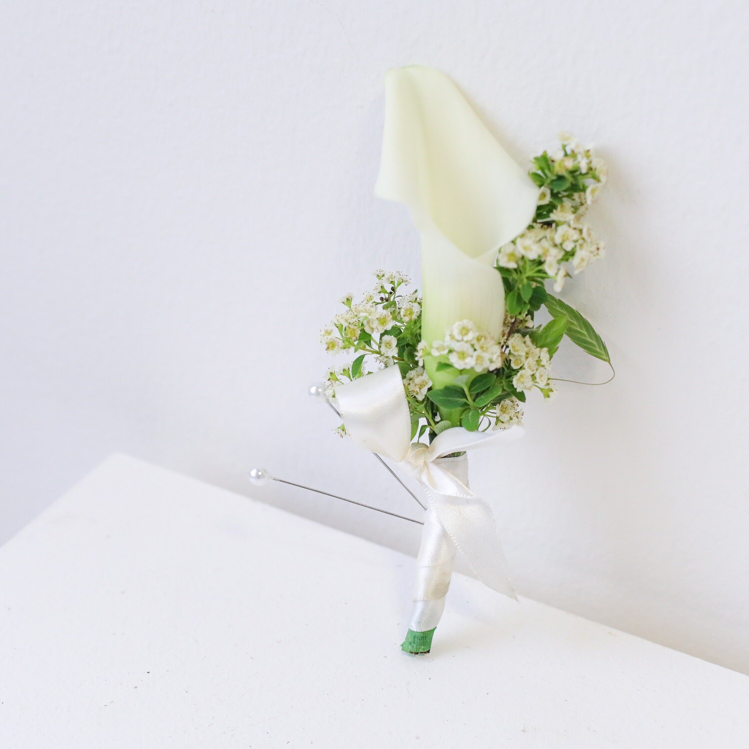 White calla lily groom boutonniere by W Floral Studio