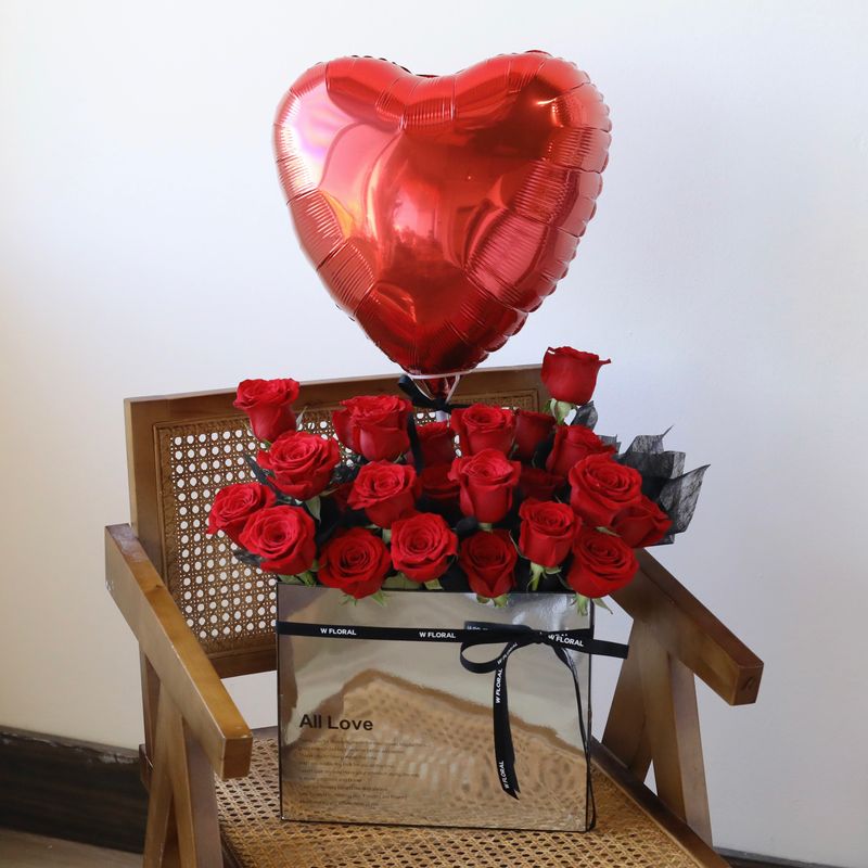 Premium Ecuadorian red roses arranged in a flower box with heart balloon by W Floral Studio