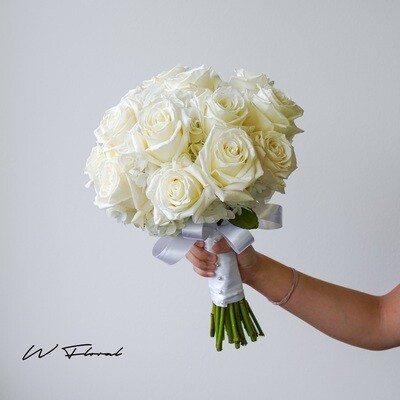 Classic white rose and hydrangea round bridal bouquet by W Floral Studio Toronto