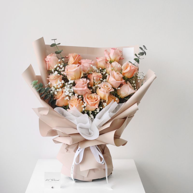 Warm salmon pink rose bouquet with 19 premium fresh roses