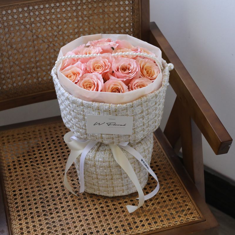 Tweed and Pearl salmon rose round bouquet with 15 fresh roses and pearls