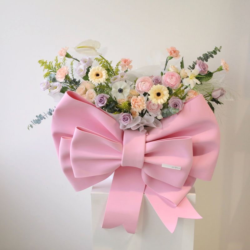 Luxury garden flower box with pink rosette bow for Toronto flower delivery