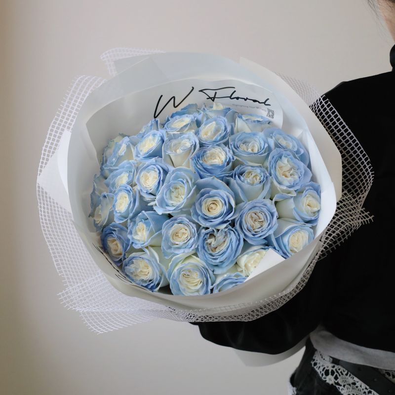 24 or 36 Icy Blue rose bouquet arranged in W Floral signature round style