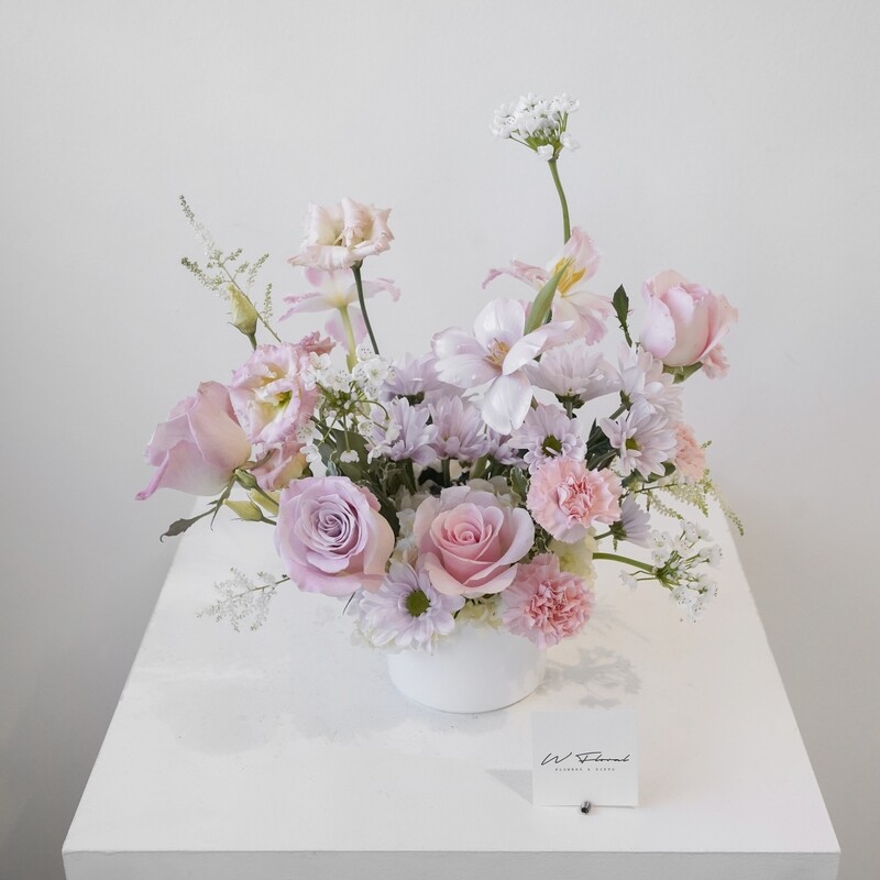 Petite round wedding centrepiece with pastel flowers in white pot by W Floral Toronto