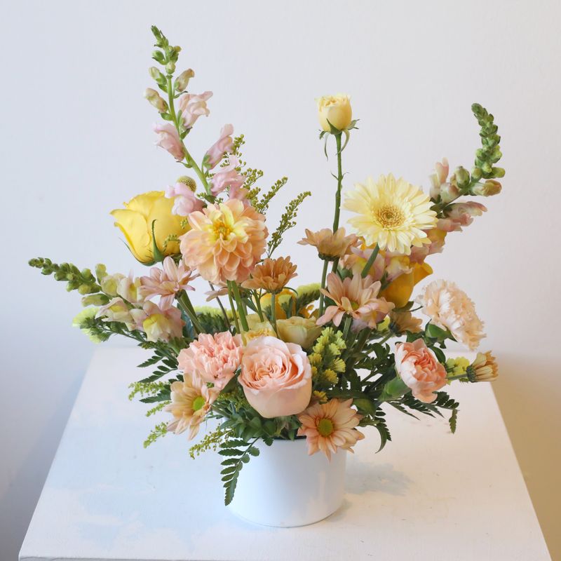 Petite round wedding centrepiece in white pot by W Floral Toronto