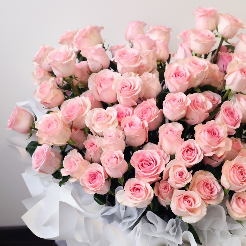 Giselle pink rose bouquet with 52 77 or 99 roses and refined ruffled wrapping