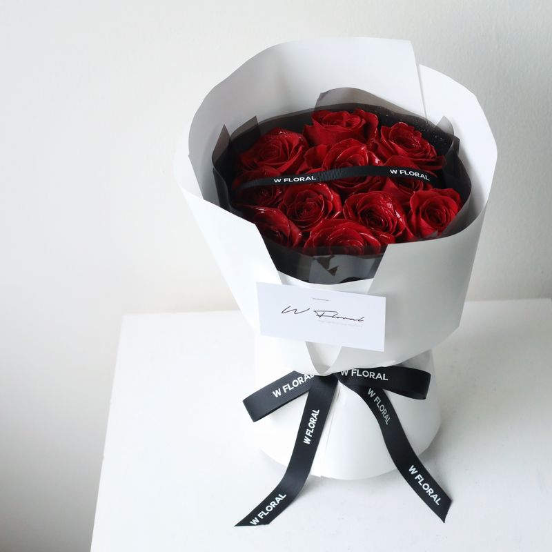 Classic red rose bouquet with elegant wrapping by W Floral Studio