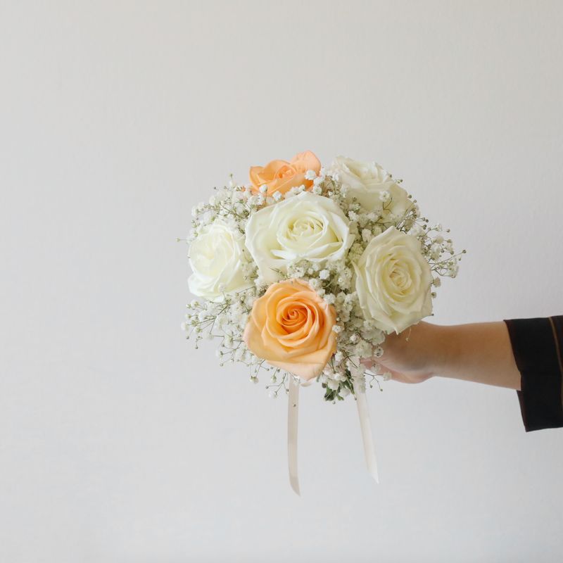 Rose and baby’s breath bridesmaid bouquet by W Floral Studio