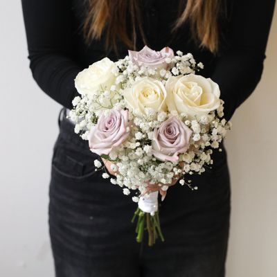 Rose and baby’s breath bridesmaid bouquet by W Floral Studio