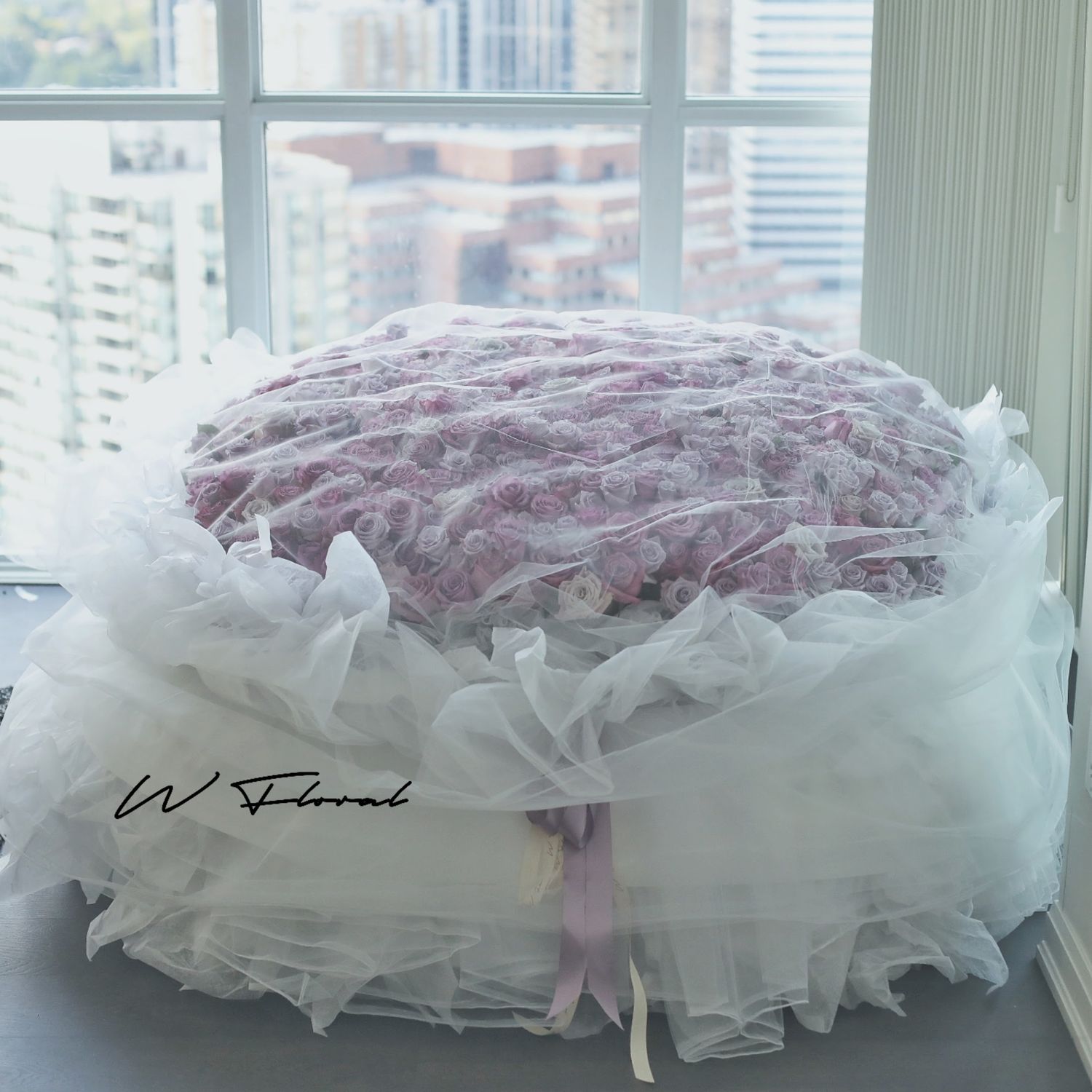 Extraordinary arrangement of 999 lavender roses for a romantic proposal