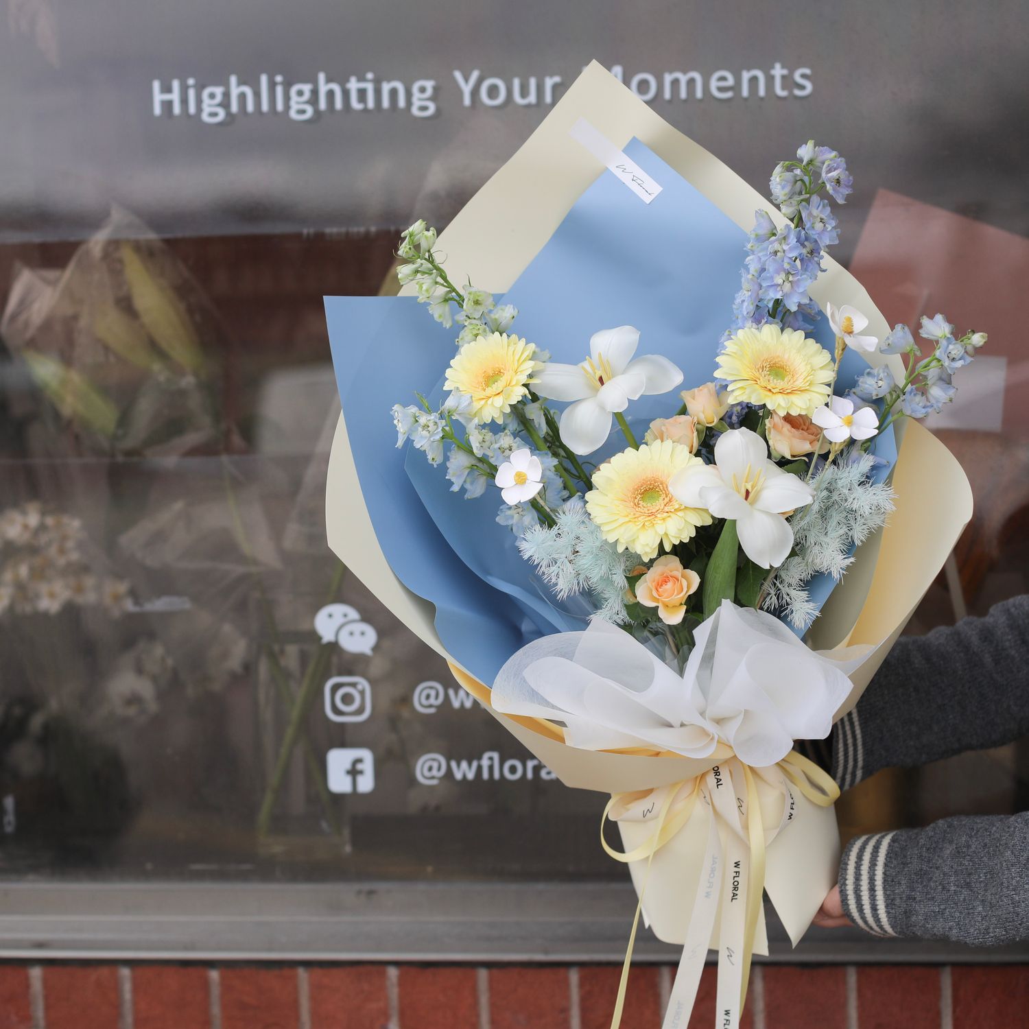 Blue and yellow mixed bouquet by W Floral Studio