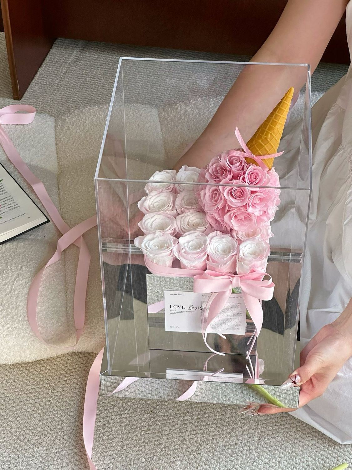 Blush pink and white preserved flower cake arrangement in Toronto