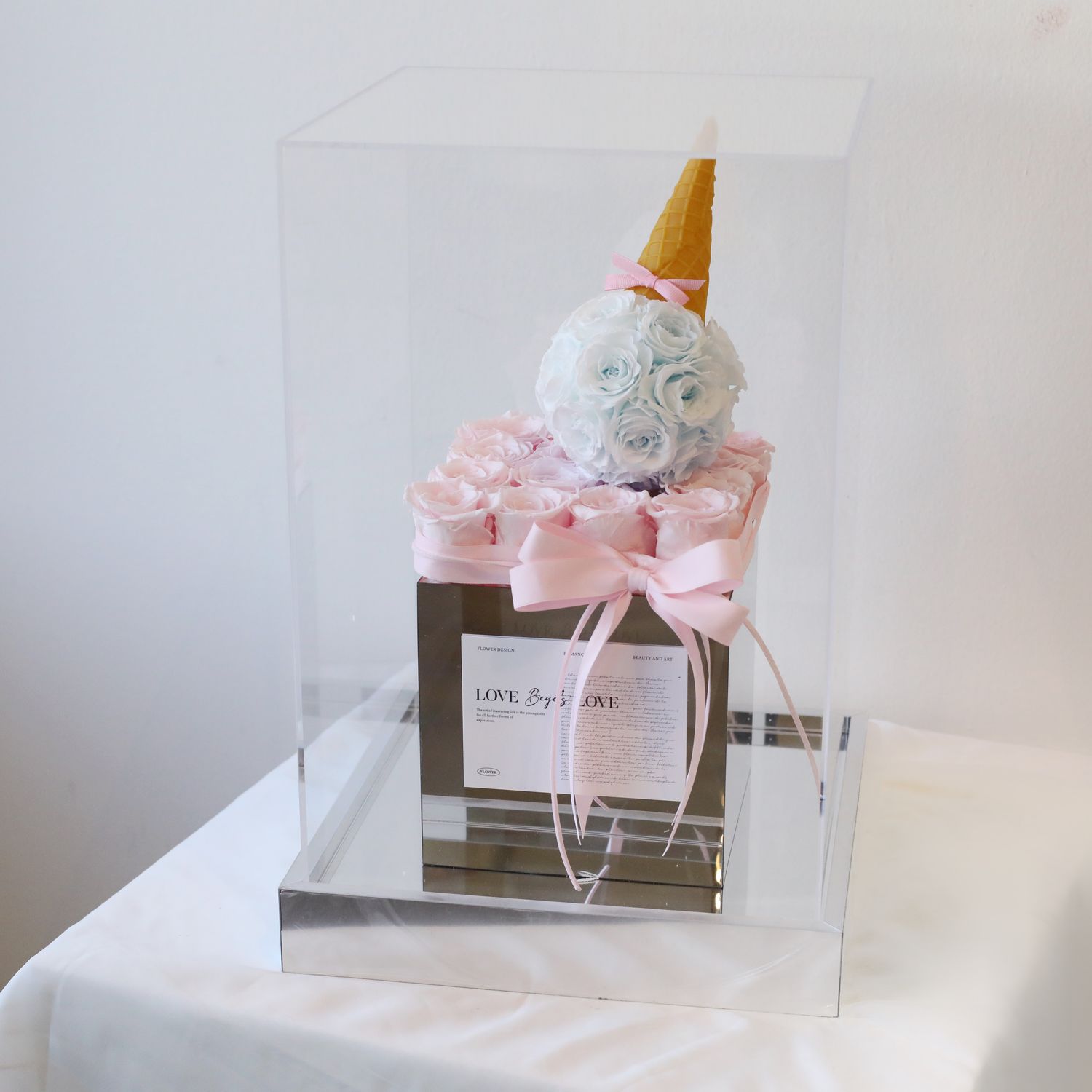 Blush pink and icy blue preserved rose gift arrangement Toronto