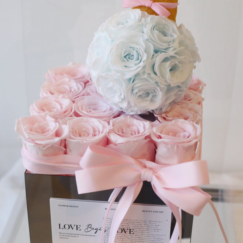 Pink and blue preserved flower arrangement by W Floral Studio