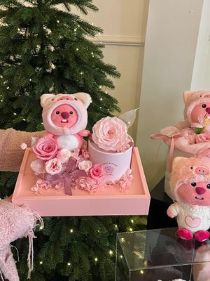 Baby Loopy preserved flower garden arrangement with cute character detail
