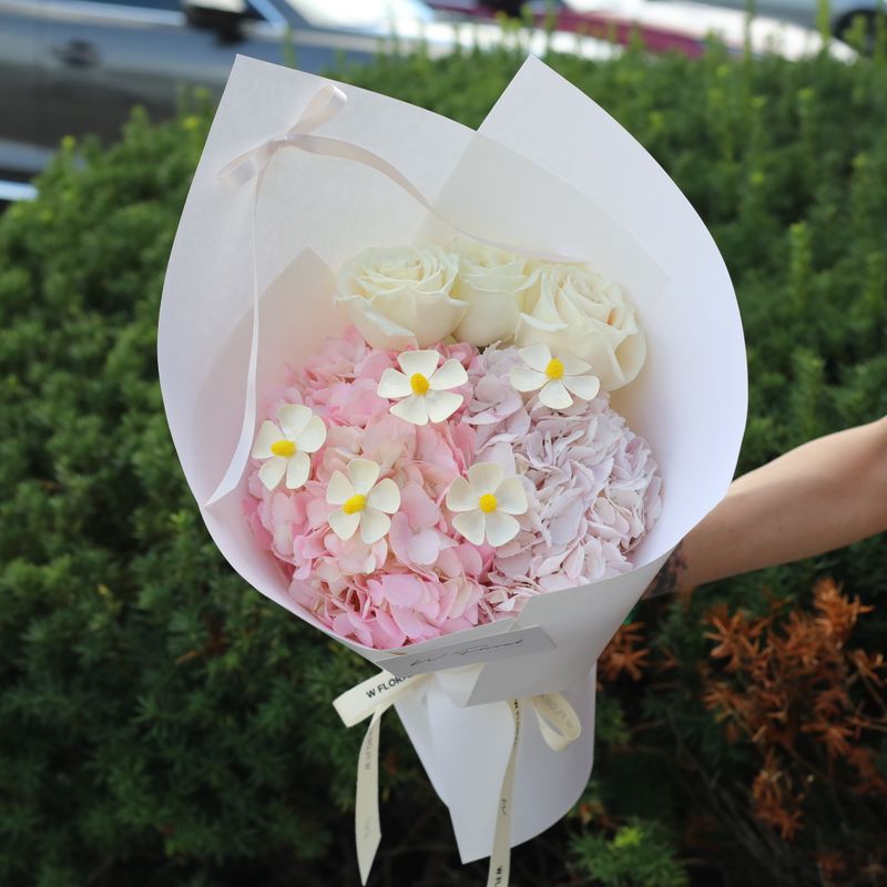 Pink hydrangea and white rose bouquet by W Floral Studio