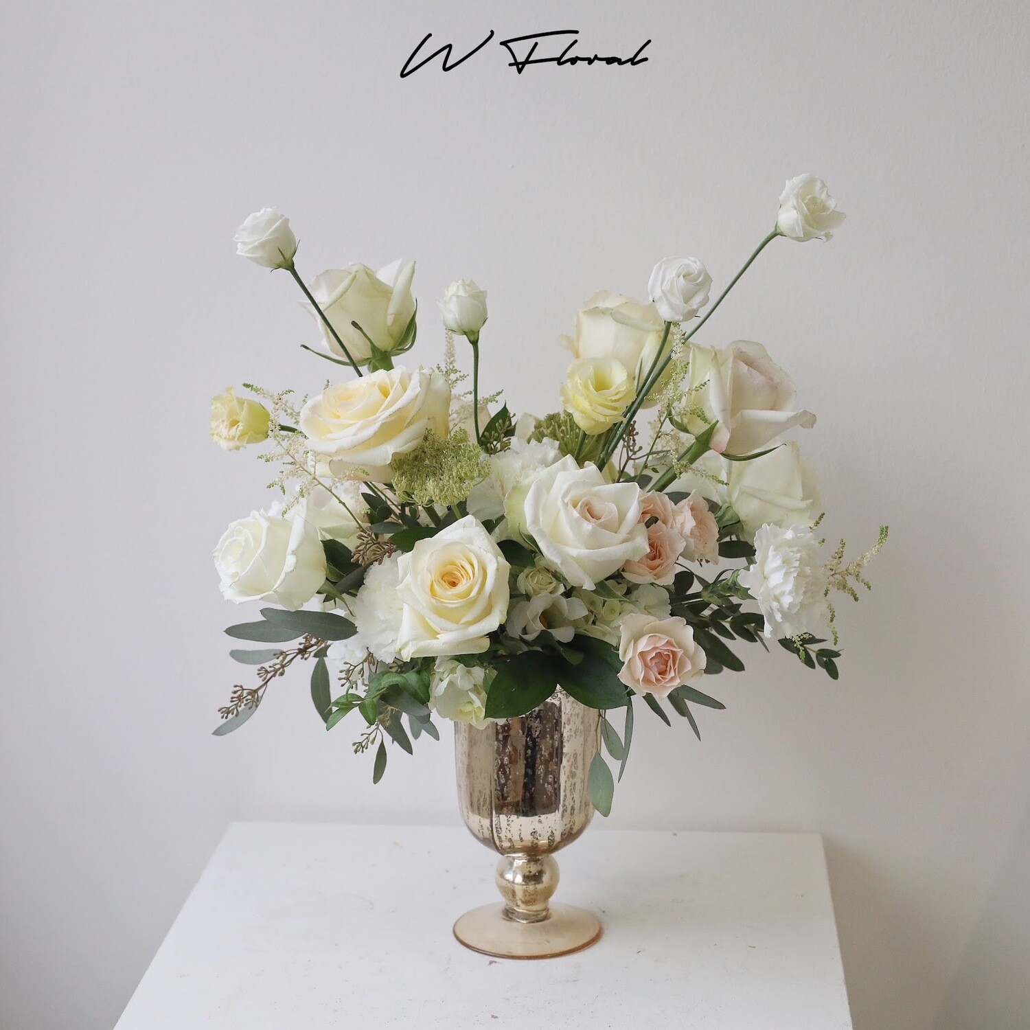 Lida Hurricane Gold Round Arrangement