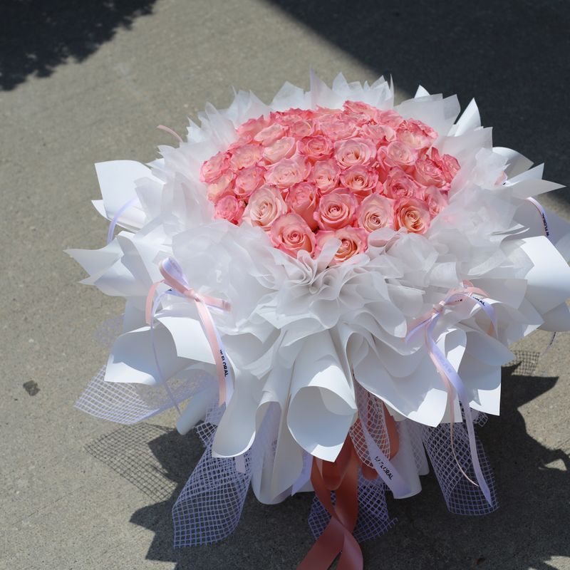 Ballet Rhoslyn rose round bouquet designed as an elegant surprise gift