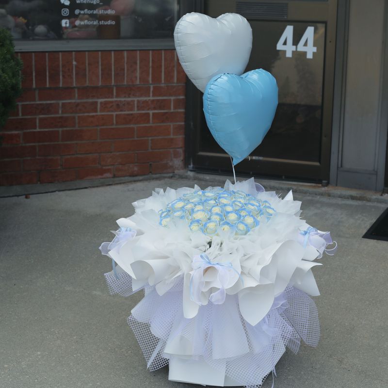 Luxury icy blue rose bouquet in a polished round style for Toronto delivery