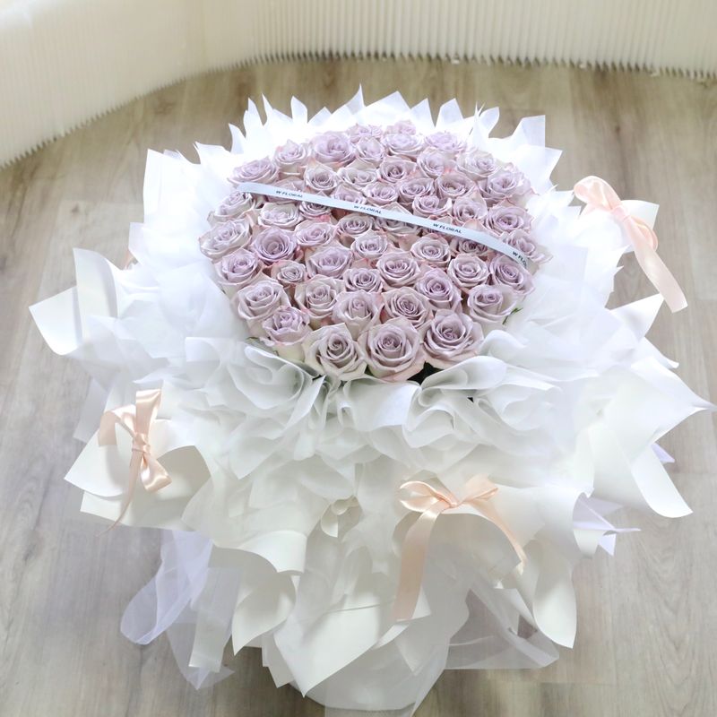 Premium purple rose bouquet with elegant ballet bow wrapping by W Floral Studio