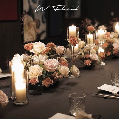 Luxury birthday table styling with roses and candlelight